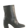 Camila, green boots