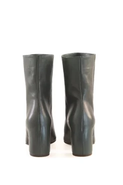 Camila, green boots