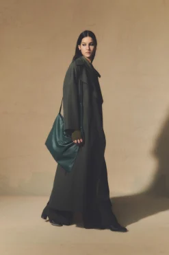 Camille, green coat