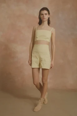 Limon, pale yellow high waisted shorts